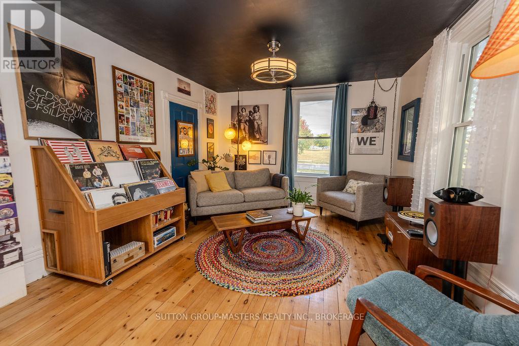 1177 Woodbine — character living room with original floors